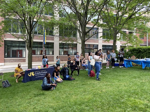 Attendees listen to a speech at the Lindy Center's end-of-year celebration in May 2022